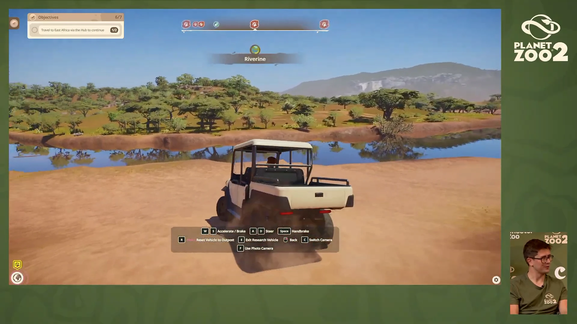 Vehículo de investigación junto a un río en Planet Zoo 2.